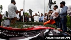 Pakistani journalists participate in a demonstration to denounce rampant censorship in the capital Islamabad on July 16.
