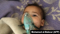 Дитина з Хан-Шейхуна в лікарні після хімічної атаки, 4 квітня 2017 року