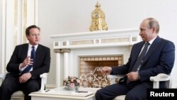 David Cameron sa Vladimirom Putinom