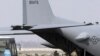 Kyrgyzstan -- US servicemen board a plane bound for Afghanistan at the US transit center at Manas airport, 07Mar2011