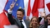 Polish presidential candidate Rafal Trzaskowski (left) holds an election rally in the city of Plock on May 11.