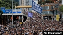 Учасники однієї з попередніх акцій протесту на вулицях Гонконга, 7 липня 2019 року