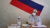 A local electoral commission member at a polling station in the village of Gigirevo in the Moscow region on June 25
