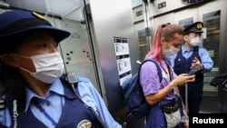 Белоруската атлетичарка Тиманускаја на аеродромот во Токио, 1 август 2021 година
