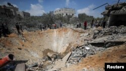 Pasojat e një sulmi izraelit ndaj një shtëpie, në Xhabalia, në veri të Rripit të Gazës, më 23 maj 2025.