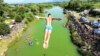 Kosovo: Competitors plunged 22 meters from the historical Fshejt Bridge at an annual high-diving contest near the Kosovo village of Xerxe.