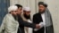 Members of Taliban delegation take their seats during the multilateral peace talks on Afghanistan in Moscow, Russia November 9, 2018. REUTERS/Sergei Karpukhin