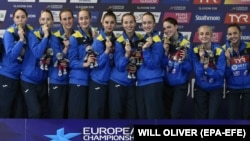 Українські представниці синхронного плавання, які здобули «золото» на чемпіонаті Європи в командній комбінації. Велика Британія, Глазго, 5 серпня 2018 року 