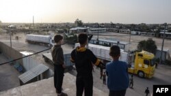 Ulazak kamiona s humanitarnom pomoći u Pojas Gaze preko graničnog prelaza Rafa s Egiptom, 26. novembar 2023.