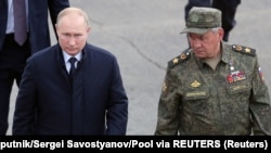 Vlagyimir Putyin elnök és Szergej Sojgu védelmi miniszter a Zapad-2021 hadgyakorlat helyszínén 2021. szeptember 13-án