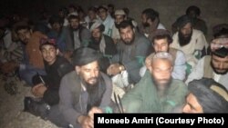 FILE: Taliban prisoners rescued by the Afghan security forces in the southern province of Helmand last year.