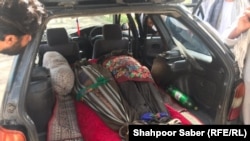 Dead bodies of the Afghans who were allegedly forced by the Iranian border guards to drown in a river that forms part of the border between the two countries.
