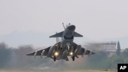 Imagine cu un avion de luptă ce participă la un exercițiu militar desfășurat de China în apropierea insulei Taiwan, coordonat din Nanjing, în estul Chinei, în aprilie 2023. 