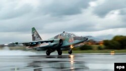 A Russian Sukhoi Su-25 fighter jet takes off from the Russian Hmeimim air base in Syria.
