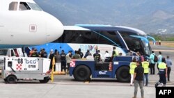 АКШдан чыгарылган мигранттар. Коста-Рика. Иллюстрациялык сүрөт.