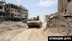 Сирійські сили у місті Дума, 8 квітня 2018 року