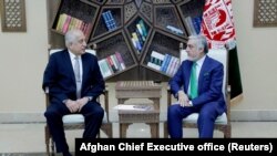 U.S. special representative for Afghanistan, Zalmay Khalilzad (left), and Afghanistan Chief Executive Abdullah Abdullah.