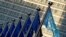 FILE PHOTO: EU flags are seen outside the EU Commission headquarters in Brussels