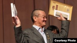 Алым Токтомушев.