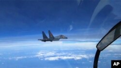 Kineski borbeni avion u patroli nad Južnim kineskim morem, 6. avgust 2016.