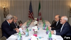 Iran’s Foreign Minister Mohammad Javad Zarif (right) and the head of the Atomic Energy Organization of Iran, Ali Akbar Salehi, meet with U.S. Secretary of State John Kerry (left) and U.S. Energy Secretary Ernest Moniz in Geneva.