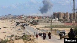 Palestinezët duke u larguar nga veriu drejt jugut të Gazës. 15 mars, 2024.
