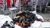 he shoes of victims are seen outside a damaged wedding hall after a blast in Kabul on August 18.