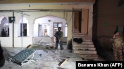 Soldiers stand guard at the premises of a mosque after a bomb blast in Quetta, the capital of southwestern Balochistan Province. 