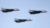 F-14 fighter jets fly over Tehran during an Army Day military parade. (file photo)