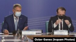 Președintele Iohannis îl susține deschis pe Florin Cîțu în cursa pentru conducerea PNL. Aici, la ședința de guvern din 14 iulie 2021.