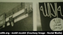 Парчами ДИИШ, ки дар пули Юнусободи Тошканд насб шуда буд.