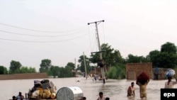 Cел каптаган аймактан бир көрүнүш.