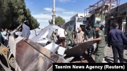 FILE: The aftermath of a suicide bombing attack outside a police station in the port city of Chabahar in Iran's southeastern province of Sistan-Baluchistan.