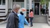 Kosovo: A man wearing a mask is seen near the Clinical Center in Kosovo. 