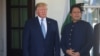 FILE: U.S. President Donald Trump talks with Pakistani Prime Minister Imran Khan as he arrives for meetings at the White House on July 22.