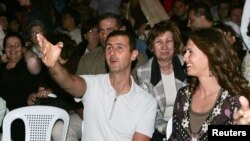 Сирия -- Президент Башар Асад и его супруга Асма на джазовом концерте в Алеппо, 7 июоя 2006 г.