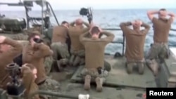 Iran released video of the U.S. sailors on their knees with their hands behind their heads.