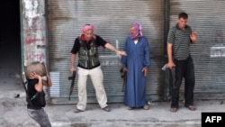 Sirijski pobunjenci u Alepu