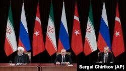 Зліва направо: президенти Ірану Хасан Роугані, Росії Володимир Путін і Туреччини Реджеп Таїп Ердоган, Сочі, Росія, лютий 2019 року