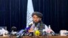 Zëdhënësi i talibanëve, Zabihullah Mujahid në konferencën e parë për media në Kabul, pas marrjes së pushtetit.