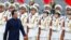 Pakistani Prime Minister Imran Khan reviews the honor guard during a welcome ceremony outside the Great Hall of the People in Beijing on October 8.