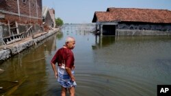 Një shteg i përmbytur në Indonezi, fotografi ilustruese