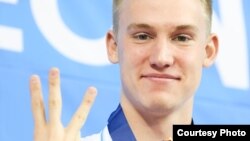 Азия ойындарында үш алтын алған қазақстандық спортшы Дмитрий Баландин. Оңтүстік Корея, Инчхон, 26 қыркүйек 2014 жыл. 