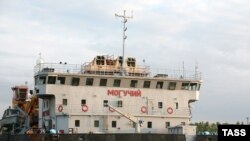The "Moguchiy," a floating crane vessel, leaving the port of Volgograd to lift the sunken "Bulgaria" on July 12.