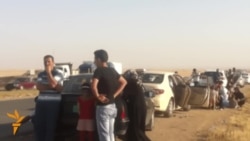 Iraqi Families Flee Mosul Fighting