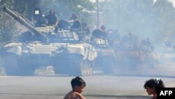 Полемика о прошлой войне в Южной Осетии протекает в условиях возможного начала новой войны