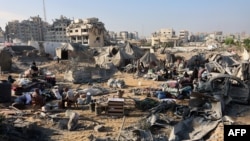 Израилдин соккуларынан кийинки Газа шаары. 