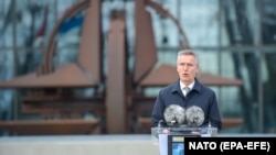 NATO Secretary-General Jens Stoltenberg speaks during a flag-raising ceremony to mark the accession of North Macedonia to NATO, at NATO headquarters in Brussels on March 30.
