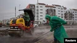 Stavljanje asfalta u Olimpijskom parku u Sočiju