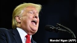 U.S. President Donald Trump speaks during a campaign rally in Evansville, Indiana, on August 30.